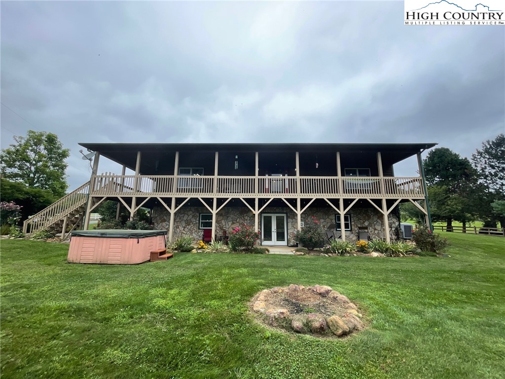 1453 Big Flatts Church Road Fleetwood, NC 28626 - Photo 6 of 50 a view of a garden and basketball court