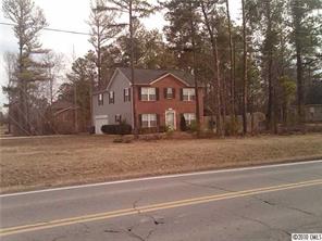 1355 North Dobys Bridge Road Fort Mill, SC 29715 - Photo 1 of 12 a front view of a house with a yard