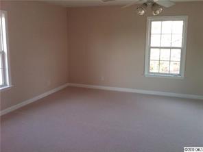 1355 North Dobys Bridge Road Fort Mill, SC 29715 - Photo 3 of 12 an empty room with a window