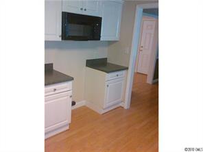 1355 North Dobys Bridge Road Fort Mill, SC 29715 - Photo 4 of 12 a kitchen with cabinets and a microwave