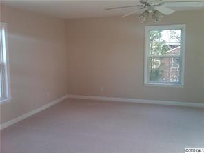 1355 North Dobys Bridge Road Fort Mill, SC 29715 - Photo 8 of 12 an empty room with a window