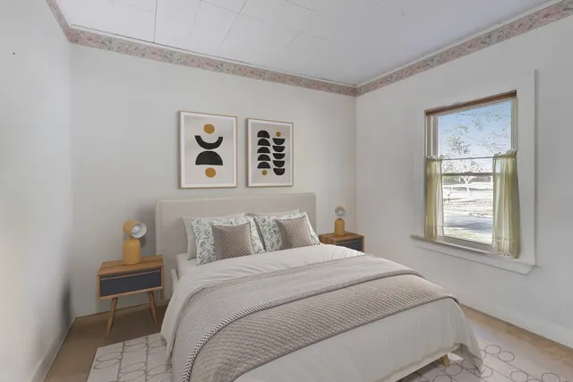 a dining room with furniture and wooden floor
