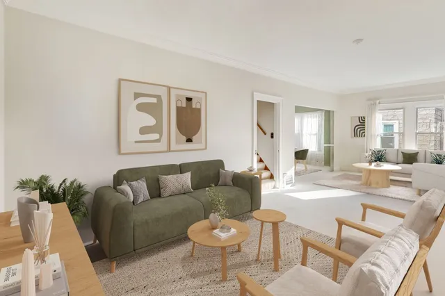 a dining room with furniture wooden floor a chandelier and a rug