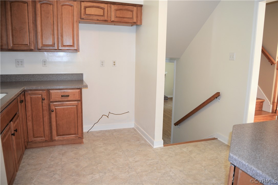 2018 Orangewood Road North Chesterfield, VA 23235 - Photo 11 of 26 a view of an empty room with stairs and a window