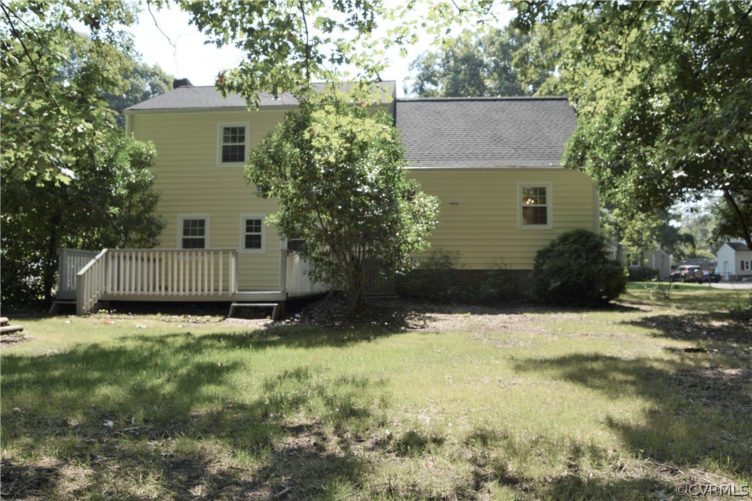 2018 Orangewood Road North Chesterfield, VA 23235 - Photo 24 of 26 a view of a house with a yard and garage