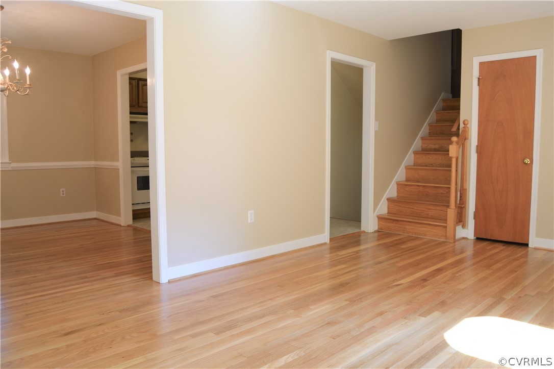 2018 Orangewood Road North Chesterfield, VA 23235 - Photo 7 of 26 an empty room with wooden floor and entryway