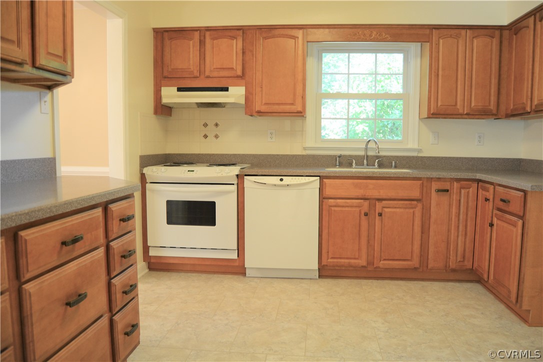 2018 Orangewood Road North Chesterfield, VA 23235 - Photo 9 of 26 a kitchen with granite countertop a sink stainless steel appliances and cabinets
