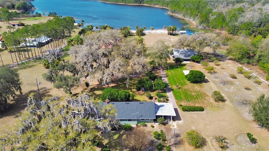 1403 Blackwelder Road De Leon Springs, FL 32130 - Photo 25 of 93 an aerial view of a house with a yard