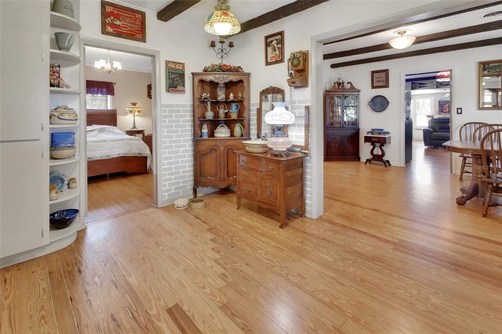 1403 Blackwelder Road De Leon Springs, FL 32130 - Photo 33 of 93 a bedroom with furniture and wooden floor