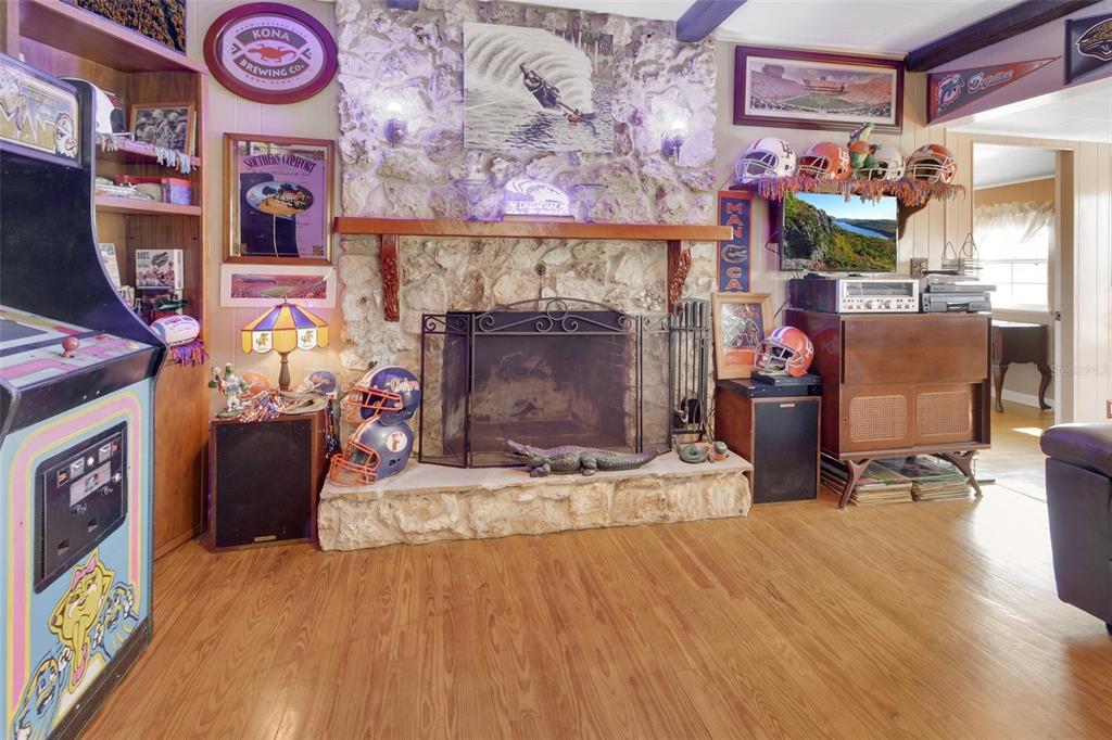 1403 Blackwelder Road De Leon Springs, FL 32130 - Photo 40 of 93 a view of a livingroom with furniture and a fireplace