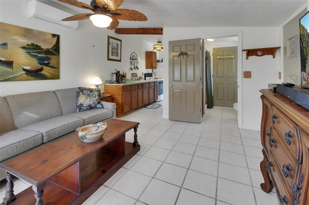 1403 Blackwelder Road De Leon Springs, FL 32130 - Photo 74 of 93 a living room with furniture and a dining table