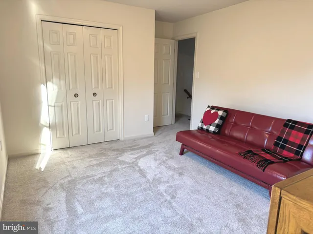 a view of a livingroom with a large window