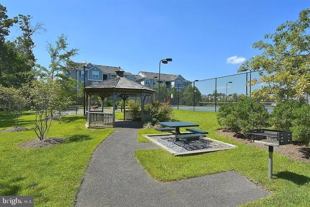 a view of a park with swings