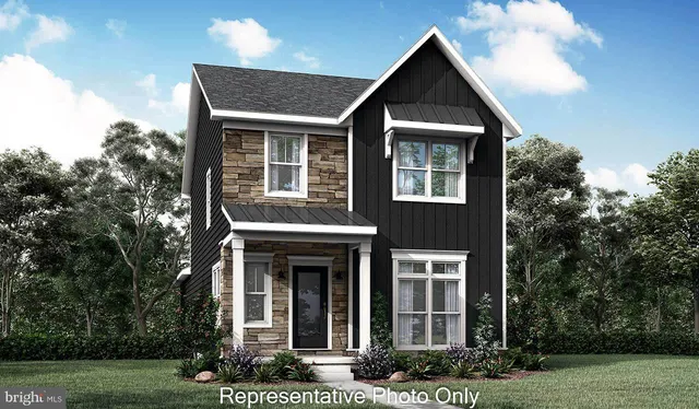 front view of residential houses with a yard