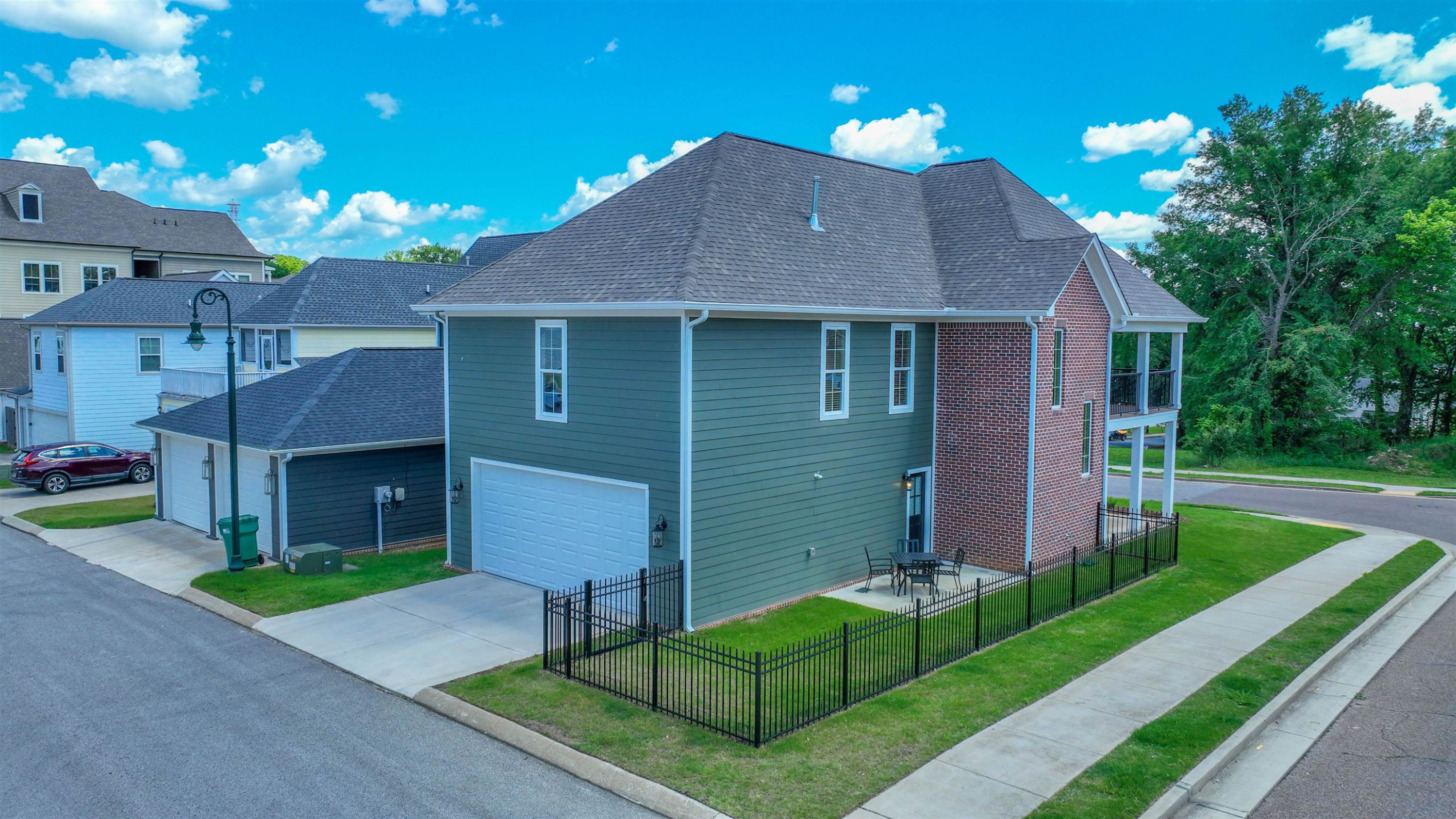 267 West Deaderick Street Jackson, TN 38301 - Photo 2 of 21 a front view of a house with a yard and garage