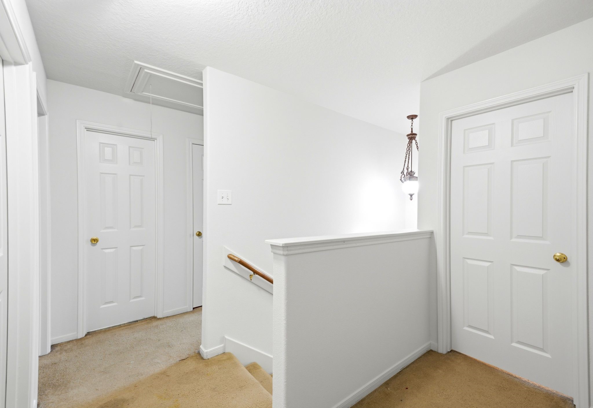 16954 Tableland Trail Conroe, TX 77385 - Photo 19 of 33 Spacious upstairs landing with easy access to secondary bedrooms and additional living areas. The functional layout offers convenient circulation and added storage space.