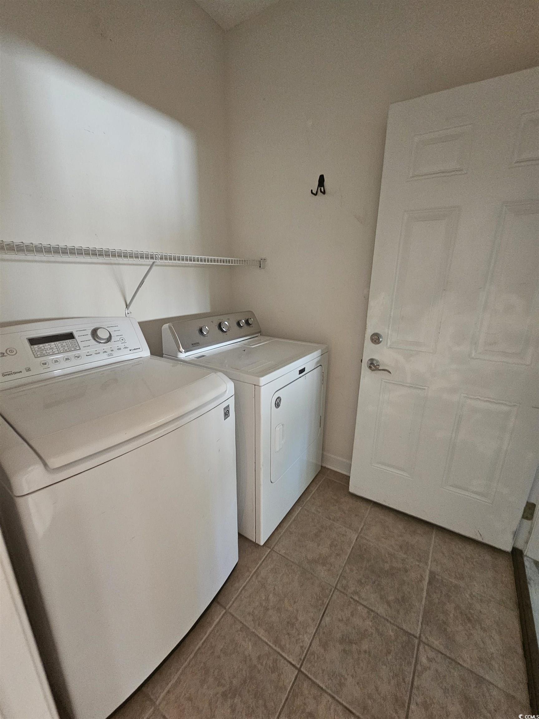 1011 Hillsdale Little River, SC 29566 - Photo 19 of 21 Washroom with separate washer and dryer and light tile patterned flooring