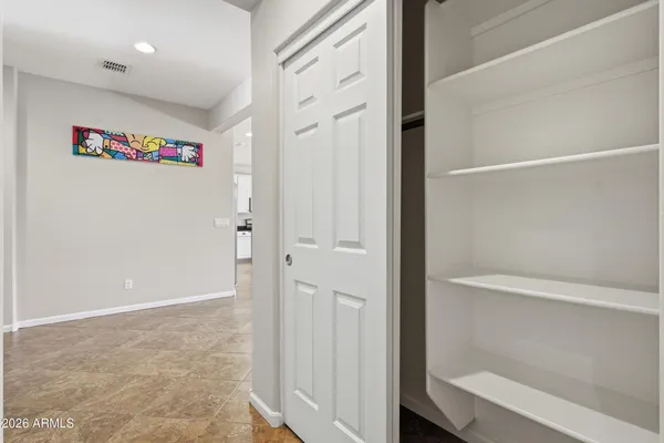 a view of an empty walk in closet