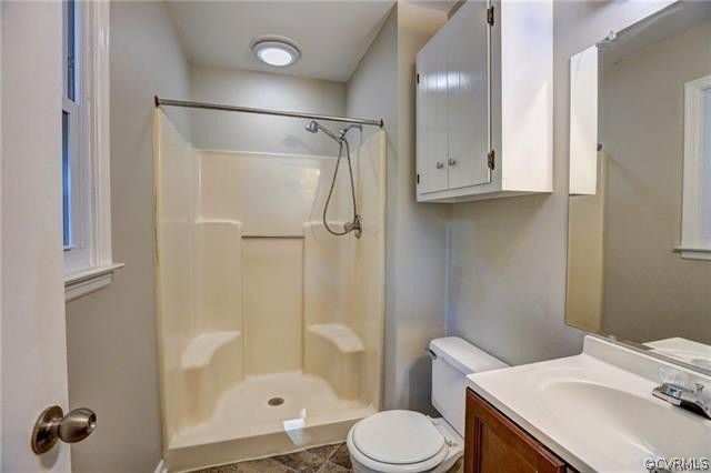 2506 Colgrave Road Midlothian, VA 23112 - Photo 14 of 21 a bathroom with a sink toilet and shower