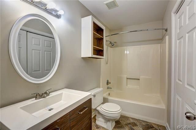 2506 Colgrave Road Midlothian, VA 23112 - Photo 15 of 21 a bathroom with a sink a toilet and a mirror