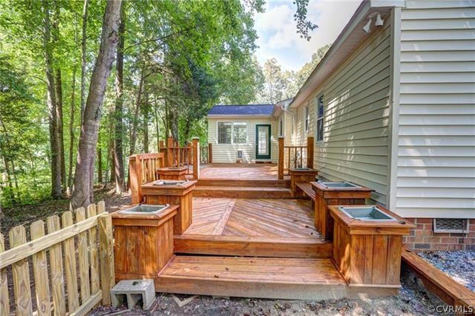 2506 Colgrave Road Midlothian, VA 23112 - Photo 17 of 21 a view of a house with backyard and sitting area