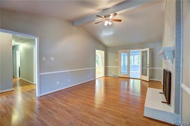 2506 Colgrave Road Midlothian, VA 23112 - Photo 4 of 21 a view of an empty room with window and wooden floor
