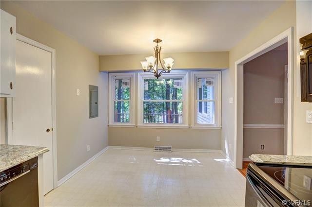 2506 Colgrave Road Midlothian, VA 23112 - Photo 7 of 21 a kitchen with chandelier and window