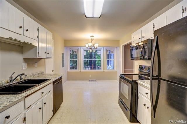 2506 Colgrave Road Midlothian, VA 23112 - Photo 8 of 21 a kitchen with granite countertop a sink stainless steel appliances and cabinets
