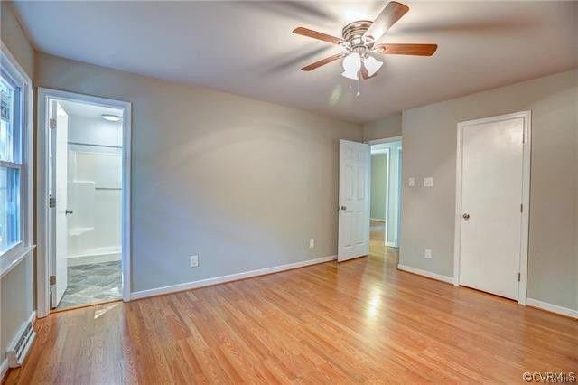 2506 Colgrave Road Midlothian, VA 23112 - Photo 9 of 21 wooden floor in an empty room with a window