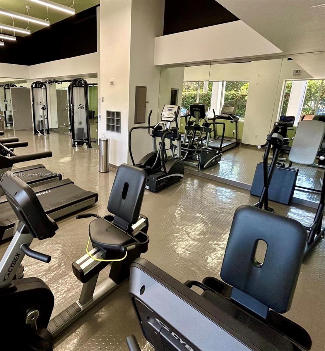 881 Ocean Drive, Unit 26B Key Biscayne, FL 33149 - Photo 31 of 34 a room with gym equipment