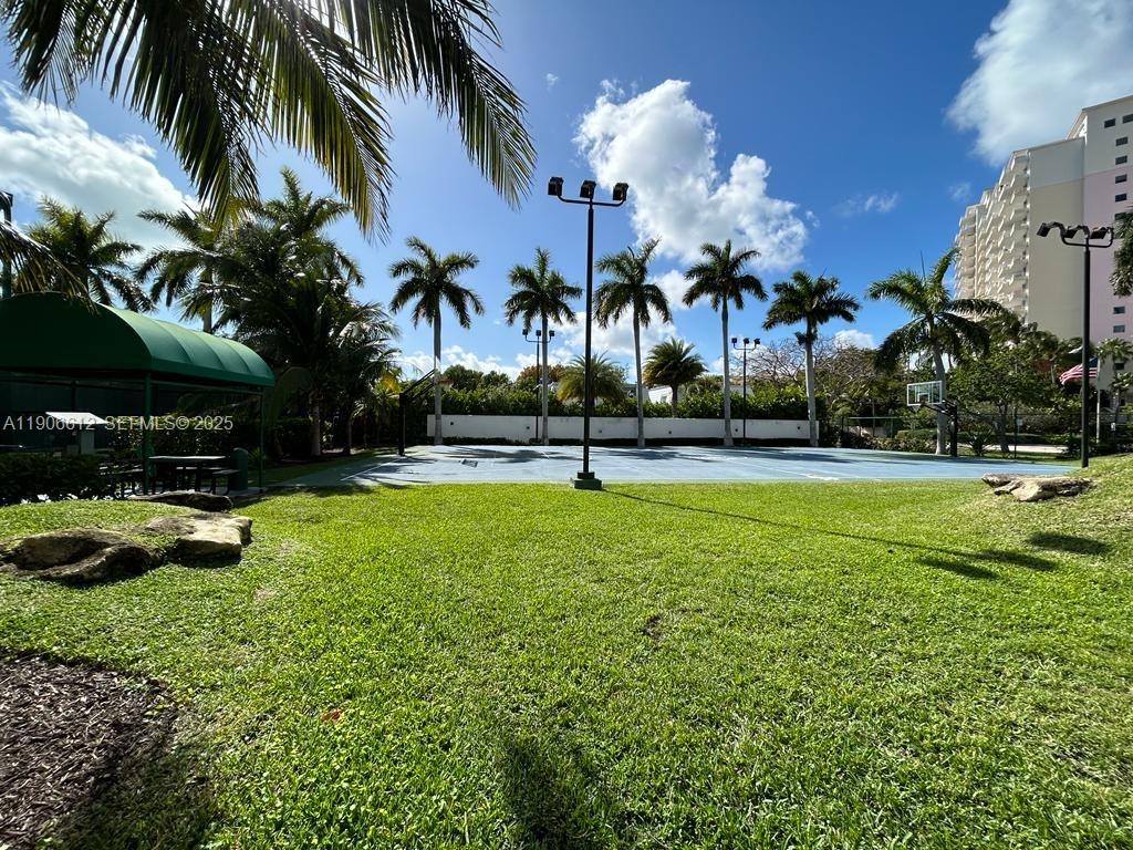 881 Ocean Drive, Unit 26B Key Biscayne, FL 33149 - Photo 32 of 34 a view of a garden
