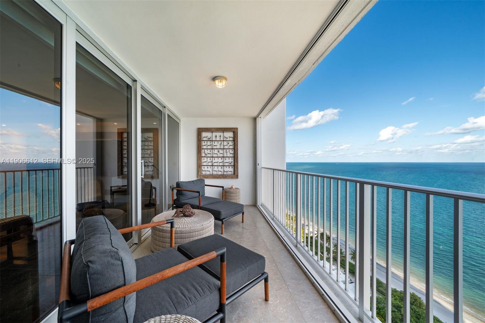 881 Ocean Drive, Unit 26B Key Biscayne, FL 33149 - Photo 10 of 34 a living room with furniture