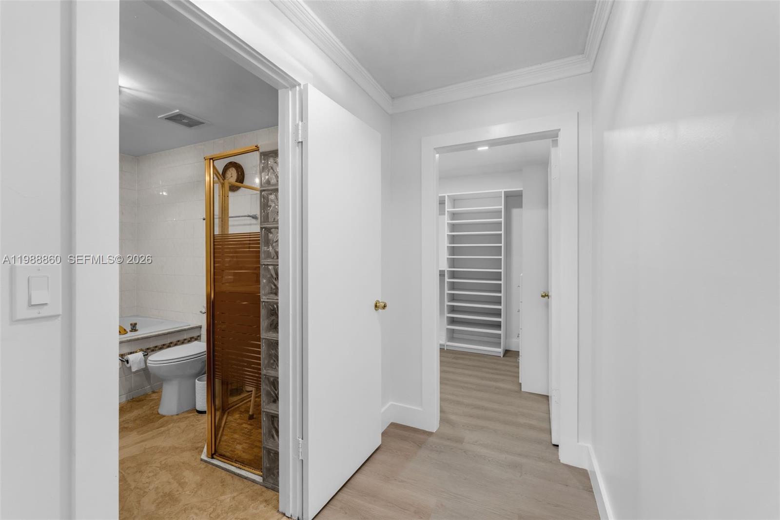 10021 Southwest 145th Place Miami, FL 33186 - Photo 14 of 44 a view of a hallway with a wooden cabinets