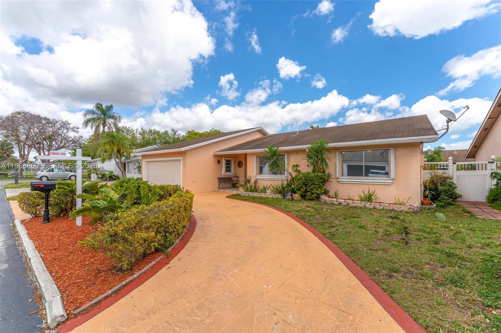 10021 Southwest 145th Place Miami, FL 33186 - Photo 2 of 44 a view of a house with backyard