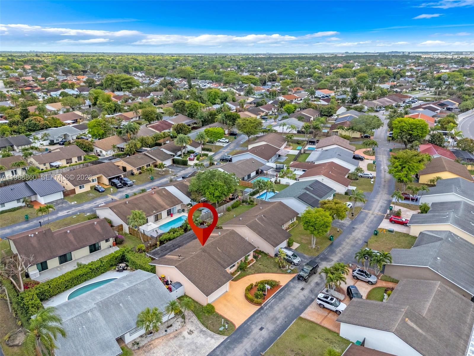 10021 Southwest 145th Place Miami, FL 33186 - Photo 33 of 44 an aerial view of a city with lots of residential buildings