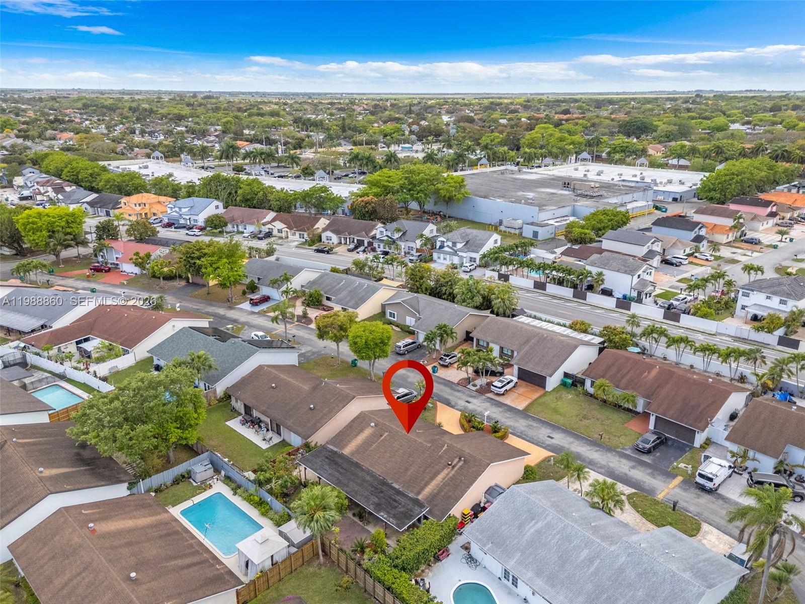 10021 Southwest 145th Place Miami, FL 33186 - Photo 35 of 44 an aerial view of residential houses with outdoor space