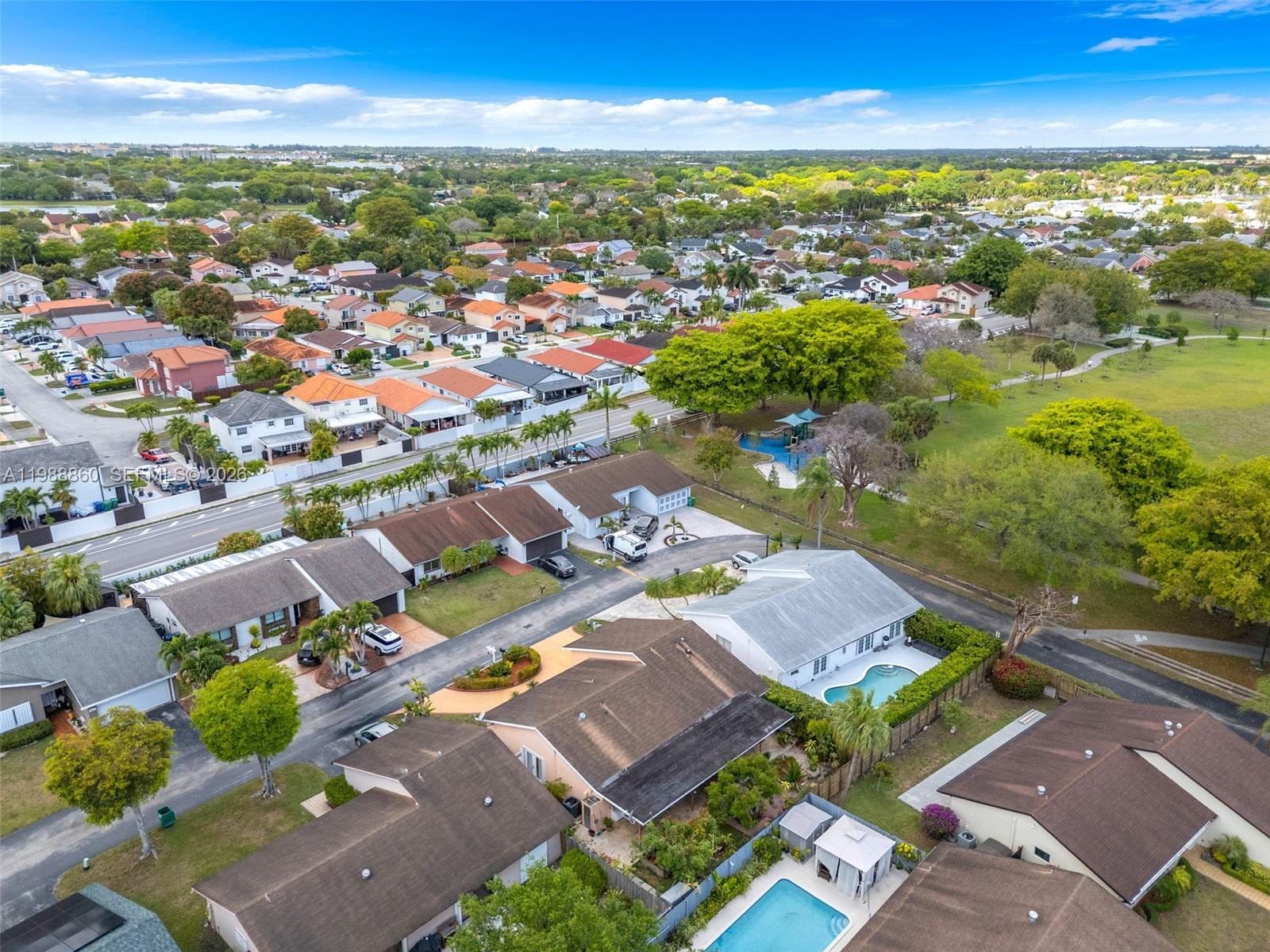 10021 Southwest 145th Place Miami, FL 33186 - Photo 38 of 44 an aerial view of residential houses with outdoor space
