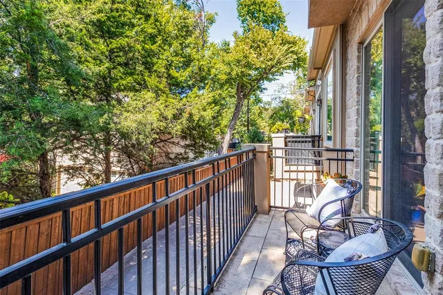 a view of balcony with furniture