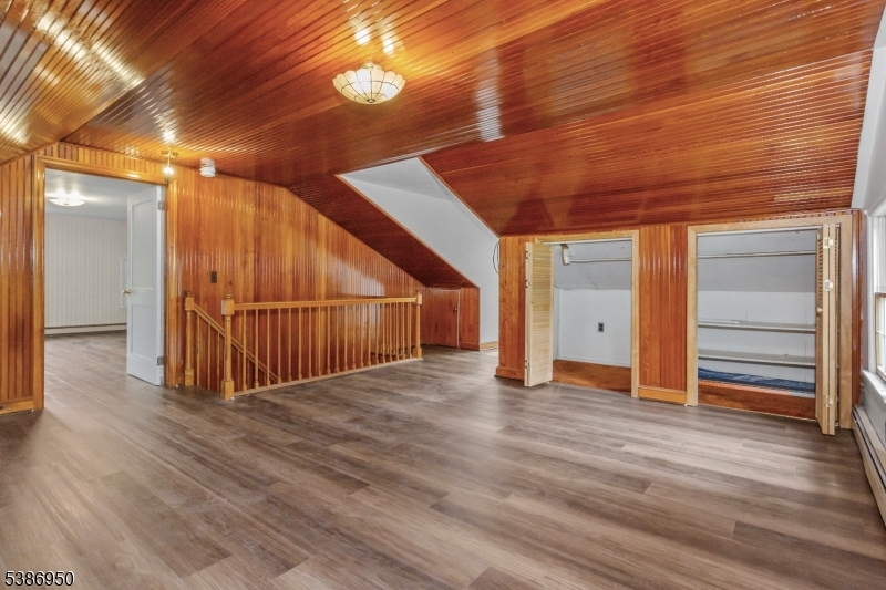 87 Glen Road Wantage, NJ 07461 - Photo 16 of 40 a view of a hallway with wooden floor