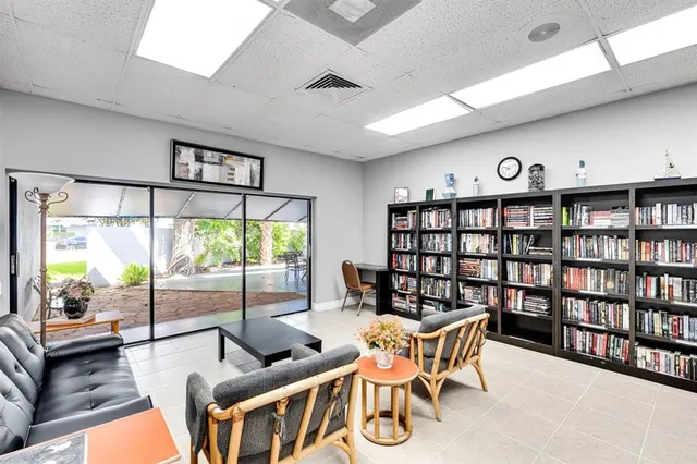 a living room with furniture or window and a flat screen tv