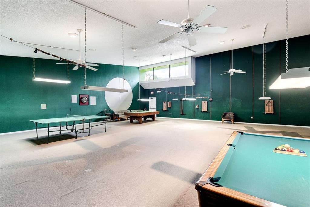 9080 Lime Bay Boulevard, Unit 109 Tamarac, FL 33321 - Photo 32 of 49 a living room with furniture