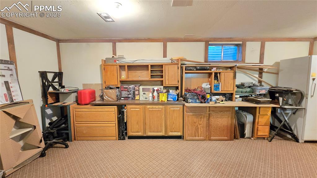 7231 South Webster Street Littleton, CO 80128 - Photo 26 of 44 a kitchen filled with a white cabinets and white appliances