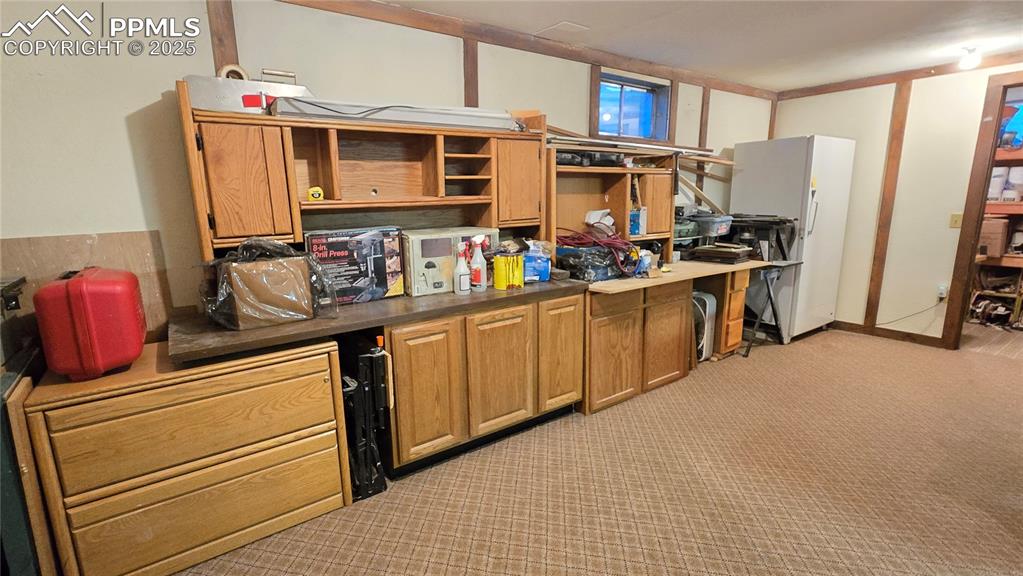 7231 South Webster Street Littleton, CO 80128 - Photo 27 of 44 a kitchen with stainless steel appliances granite countertop a refrigerator stove and sink