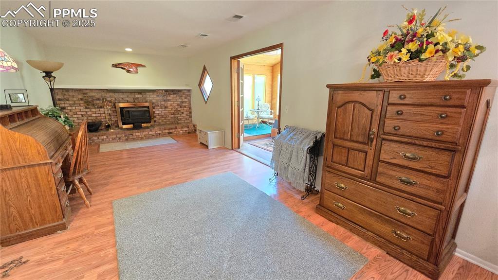 7231 South Webster Street Littleton, CO 80128 - Photo 28 of 44 a living room with furniture and a fireplace