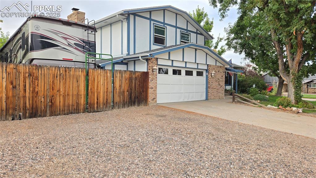 7231 South Webster Street Littleton, CO 80128 - Photo 4 of 44 a view of a house with a street