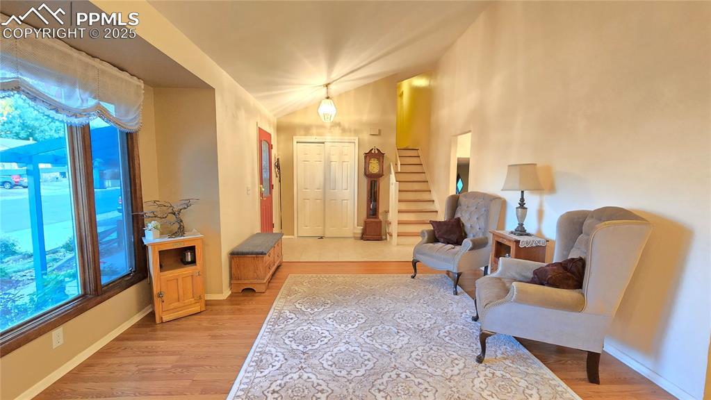 7231 South Webster Street Littleton, CO 80128 - Photo 5 of 44 a living room with furniture and a large window