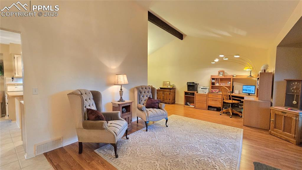 7231 South Webster Street Littleton, CO 80128 - Photo 6 of 44 a living room with furniture and a table