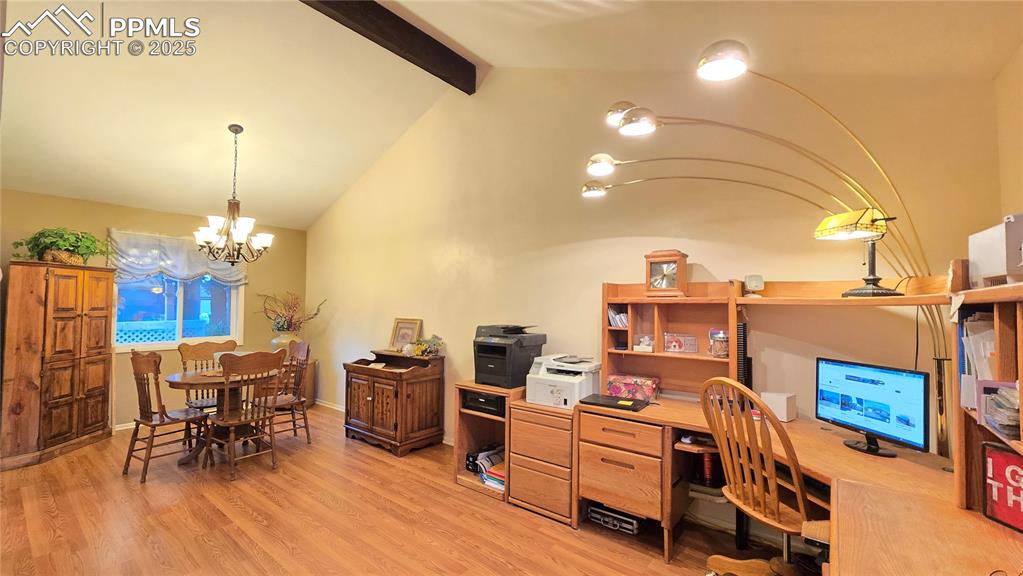 7231 South Webster Street Littleton, CO 80128 - Photo 8 of 44 a room with furniture and a chandelier