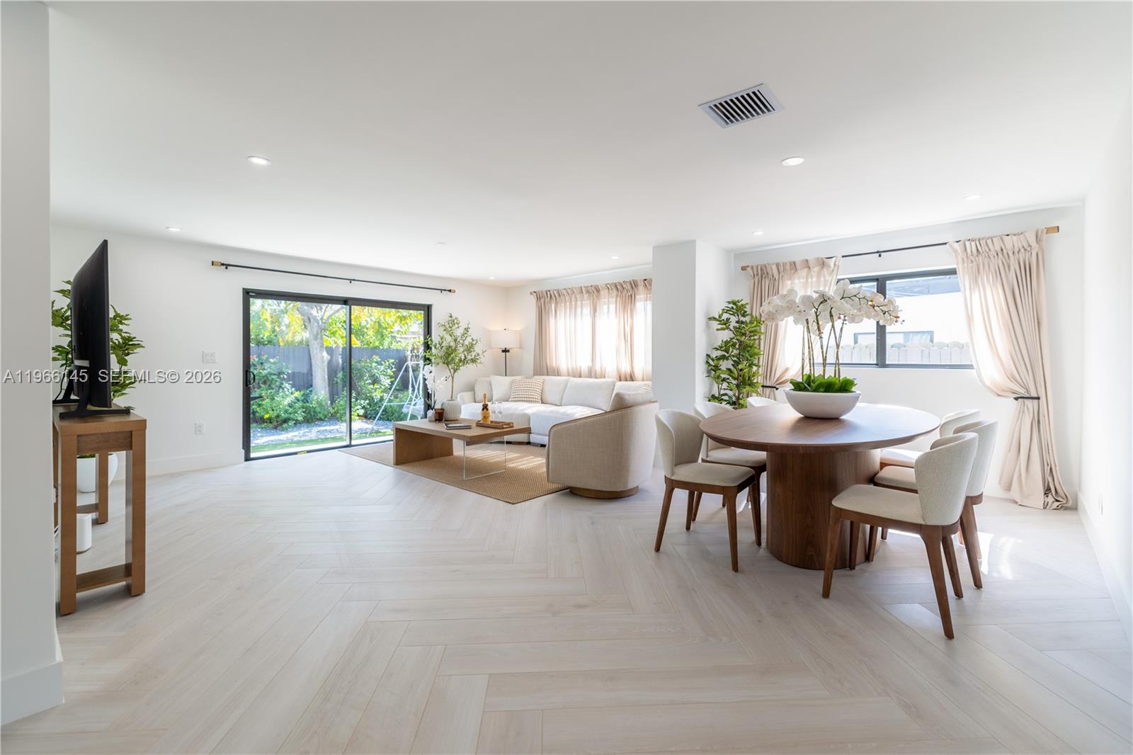 1420 Southwest 17th Street Miami, FL 33145 - Photo 13 of 49 a living room with furniture and a large window