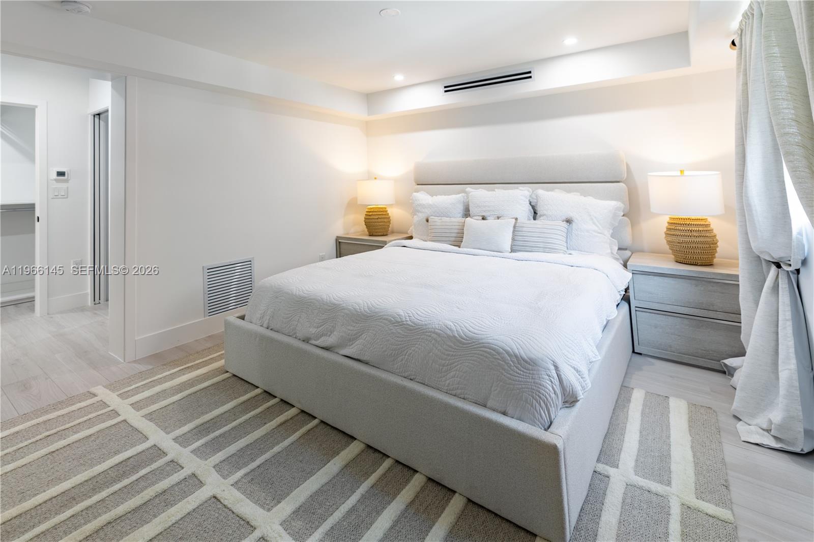 1420 Southwest 17th Street Miami, FL 33145 - Photo 28 of 49 a bedroom with a bed and a walk in closet